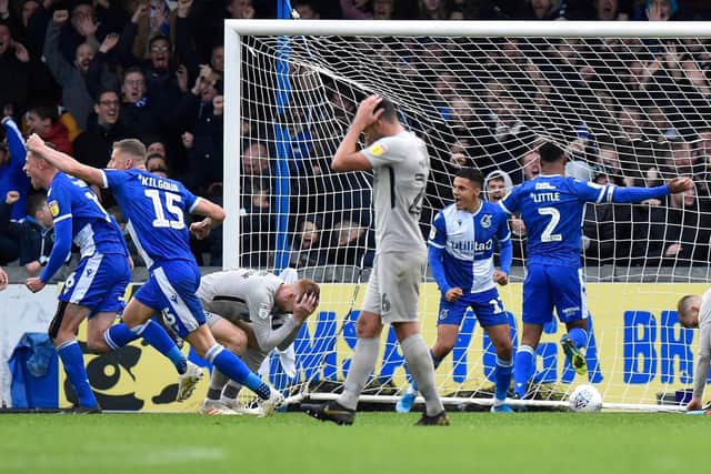 Pompey dejected after conceding a stoppage-time equaliser at Bristol Rovers. Picture: Graham Hunt