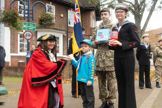 From left, mayor of Gosport Cllr Kathleen Jones, Alex Ryecroft 5th Gosport Beavers, Joshua Carr Army Cadet Force Gosport Platoon and Keira Hadley of Gosport Sea Cadets. Picture: Keith Woodland (261019-32)