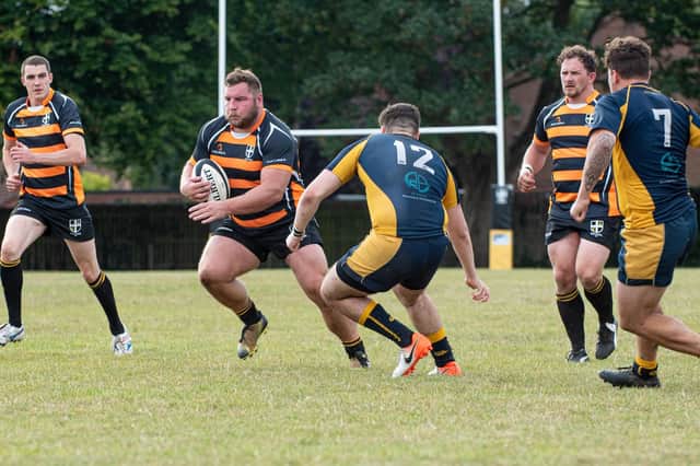 Dan Sargent (with ball) was among the points in Portsmouth's loss at Weybridge Vandals