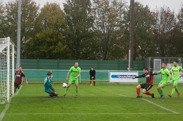 Luke Slade scores his fourth goal of the afternoon against Alresford