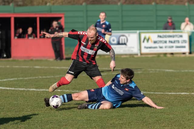 Fareham's Ash Tattersall and AFC Portchester's Michael Turvey in an El Creekio derby last season