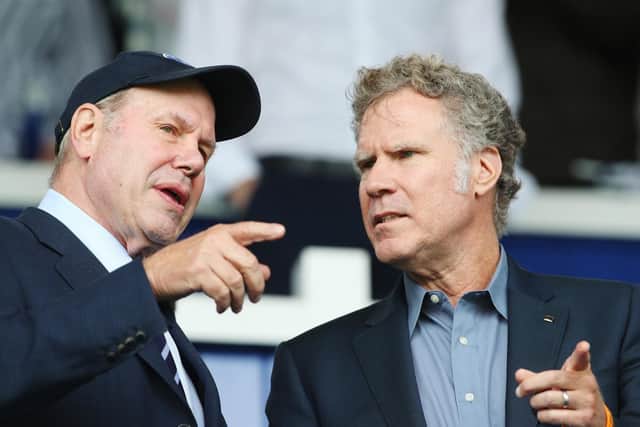 Pompey chairman Michael Eisner, seen here with Will Ferrell at Fratton Park in August, has given his backing to Kenny Jackett: Picture: Joe Pepler
