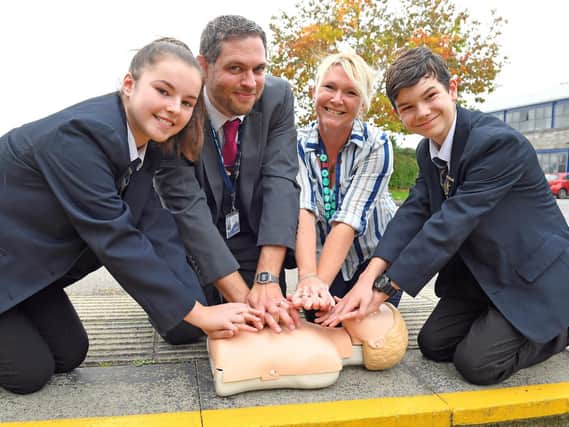 Pupils and staff learn how to restart a heart.

Picture: Malcolm Wells