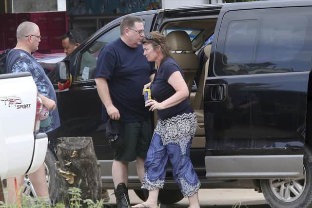 Linda Schultes, right, mother of British backpacker Amelia Bambridge, arrives in a van together with her family members at the Sihanoukville Referral Hospital in Sihanoukville province, Cambodia. Picture: AP Photo/Heng Sinith