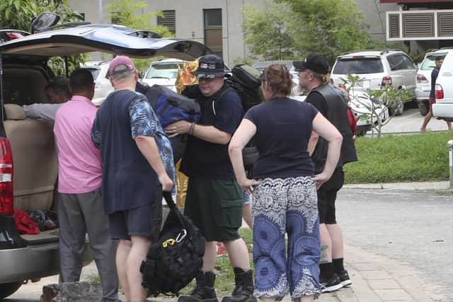 Family members of British backpacker Amelia Bambridge arrive at Sihanoukville Referral Hospital in Sihanouk province, Cambodia. Picture: AP Photo/Heng Sinith