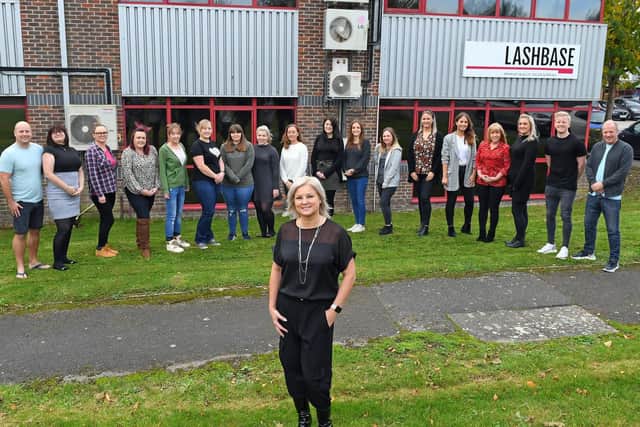 Julie Butler with Lashbase's employees 
Picture: Malcolm Wells (191030-9117)