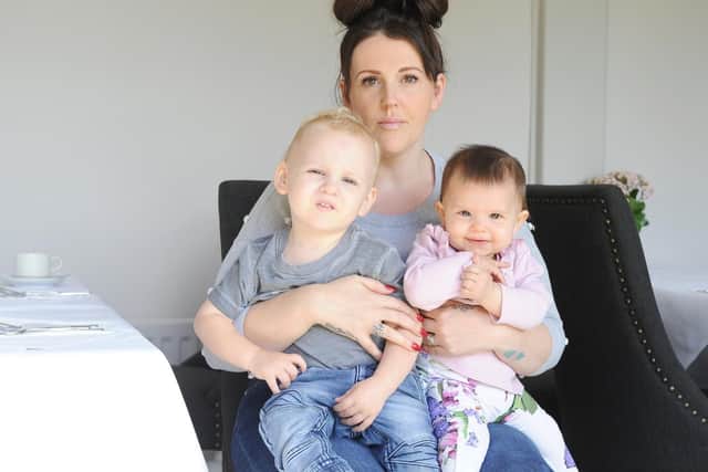 Jemma Spurr, 36, with two of her children. The family ended up spending several weeks living in a hotel after their home was damaged by a fire caused by a suspected faulty tumble dryer.
Picture : Habibur Rahman