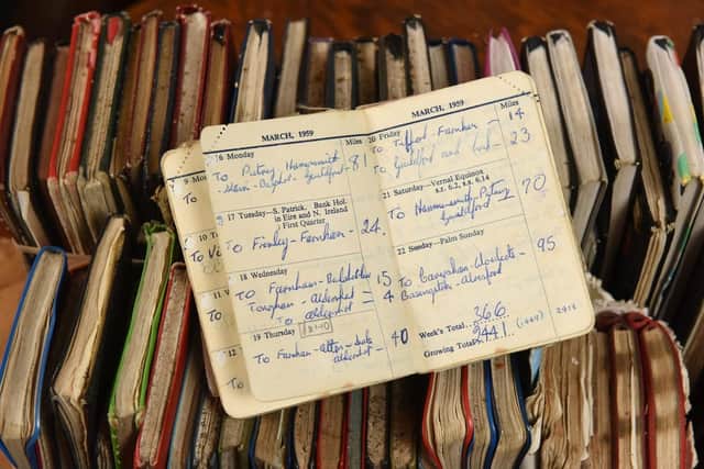 Pictured:  Russ has kept note of the miles he has cycled each day, written within dozens of diaries.Retired civil servant Russ Mantle is set to become the first person in the UK to cycle one million miles in their lifetime - having meticulously recorded his mileage for 67 years.  The keen cyclist will this week achieve the astonishing milestone at the age of 82 on his cherished Holdsworth road bike which he has owned since 1964.Since 1952 Mr Mantle has carefully recorded every ride in his diary as he cycled to and from work, competed in races and pedalled up some of the world's highest mountains during tours across Europe and America.  Mr Mantle - nicknamed 'mile-eater Mantle' by admiring friends in the cycling community - completed a staggering 22,550 miles in 2001, which is nearly enough to circumnavigate the globe.  SEE OUR COPY FOR DETAILS. Simon Czapp/Solent News & Photo AgencyUK +44 (0) 2380 458800