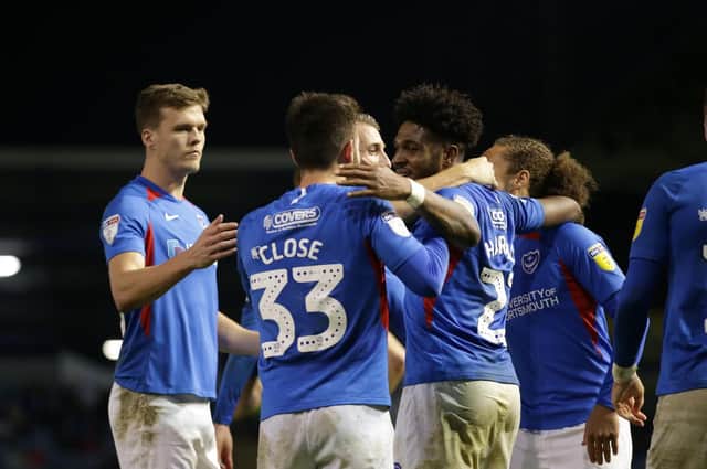 Ellis Harrison celebrates his second goal with his Pompey team-mates