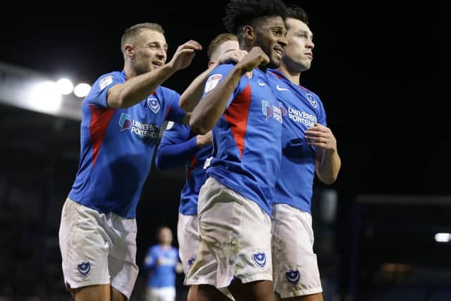 Ellis Harrison celebrates with Lee Brown, Ronan Curtis and John Marquis after scoring from the spot against Southend. Picture: Robin Jones/Getty Images