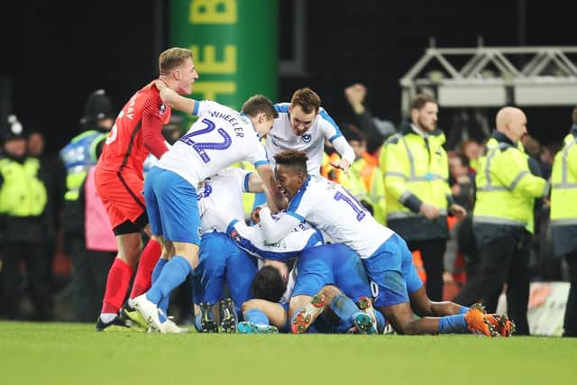 Pompey celebrate the FA Cup third round win at Norwich last season