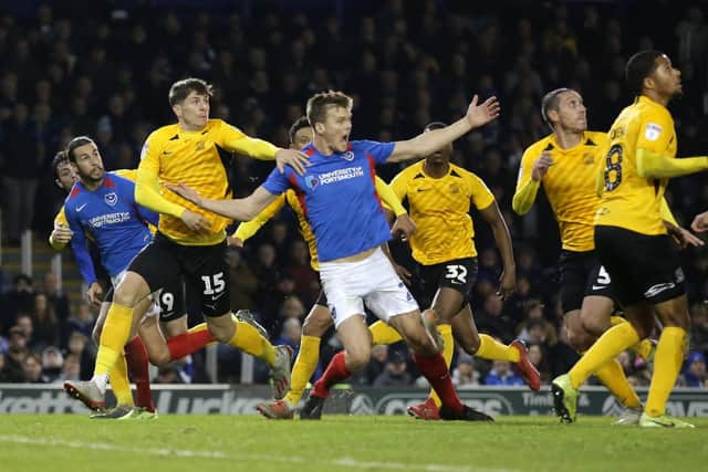 Sean Raggett was dragged down by Rob Kiernan to win Pompey a penalty against Southend. Picture: Robin Jones