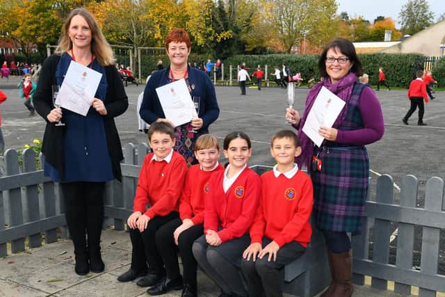 Teachers from left, Michelle Marum, Debbie Martin and Liz Baldwin who are now all teaching at Wallisdean Junior School in Fareham, Hampshire. Pupils from left, Alexander McGrigor, 10, Poppy Smith, 10, Alice Boccolini, 10 and Daniel Lovell, 11. Picture: Malcolm Wells (061119-9609)