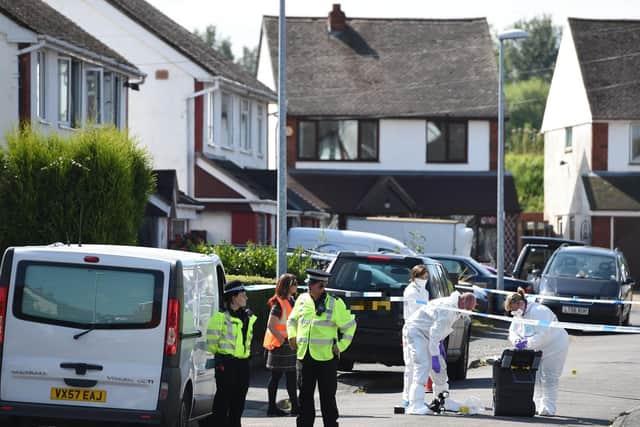 Police at the scene outside an address in Meadow Close in the Trench area of Telford, after former Aston Villa footballer Dalian Atkinson died. Picture: Joe Giddens/PA Wire