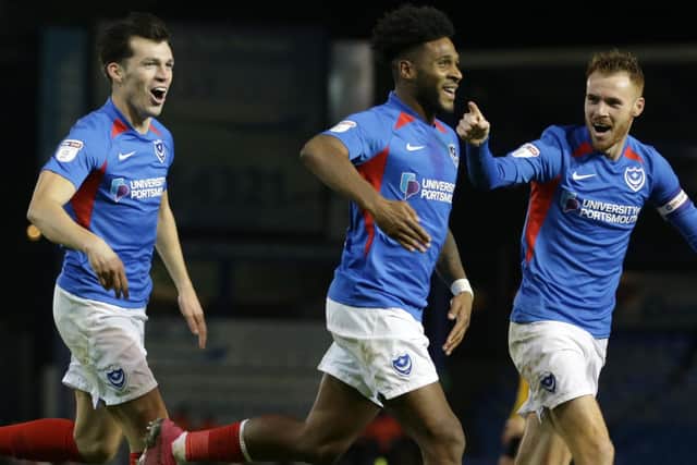 Tom Naylor, right, celebrates with team-mates Ellis Harrison and John Marquis during the win over Southend   Picture: Robin Jones