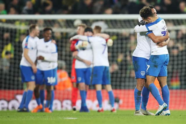 Pompey celebrate their memorable last-gasp victory at Norwich in last season's FA Cup. Picture: Joe Pepler