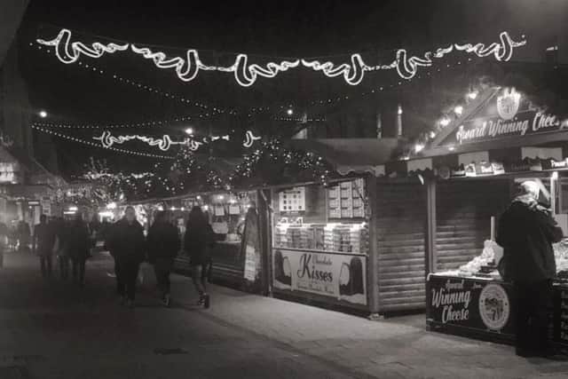 There's no better spot for a Christmas photo than under the market's fairy lights. Picture: Portsmouth Christmas Market