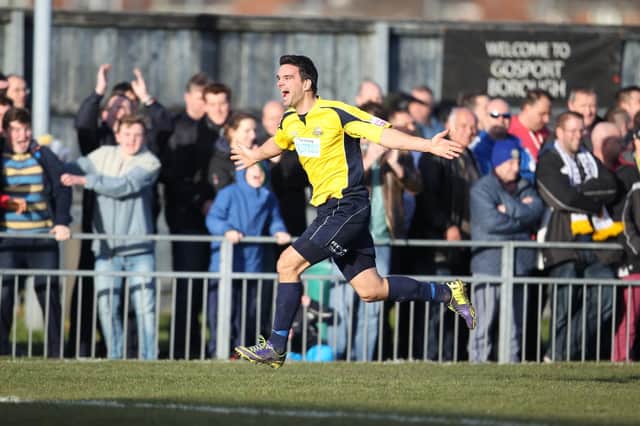 Gosport's Tim Sills celebrates one of his two goals in Borough's 2-0 Trophy semi final second leg win over Hawks in 2014 - one of two occasions Hawks have reached the last four.