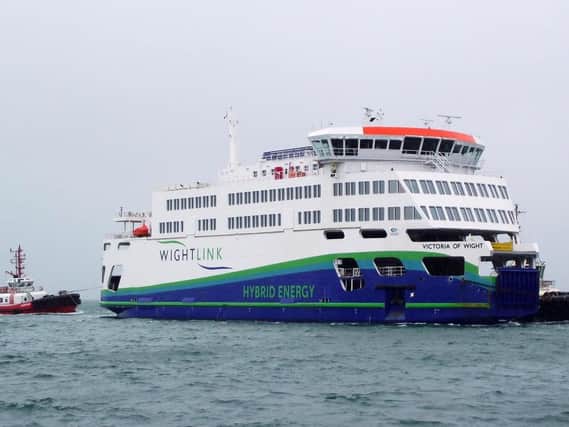 The Isle of Wight ferry, Victoria of Wight approaches Portsmouth Harbour.