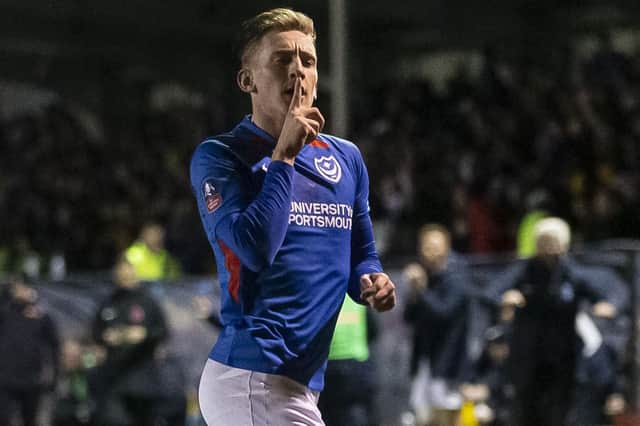 Ronan Curtis of Portsmouth celebrates after scoring his side's second goal