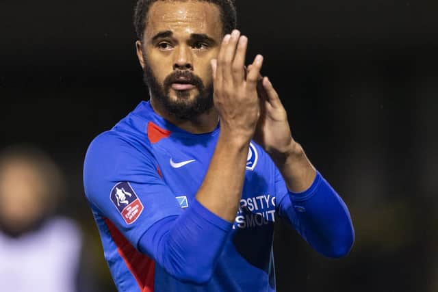 Anton Walkes applauds the Pompey fans following a rare first-team outing on Monday night. Picture: Daniel Chesterton/PinPep