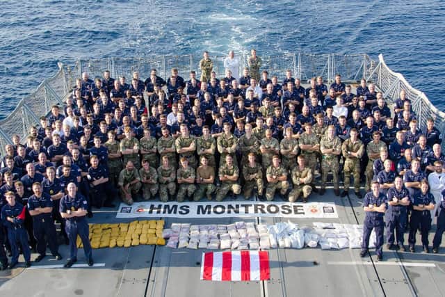 HMS Montrose's crew pictured with their haul of seized drugs. Photo: Royal Navy/Chris Daly