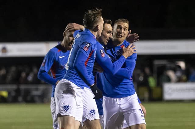 Pompey celebrate Brandon Haunstrup's equaliser against Harrogate Picture: Daniel Chesterton