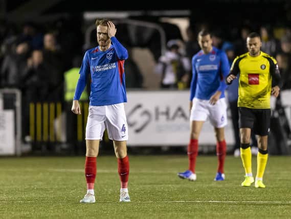 A dejected Tom Naylor contemplates conceding from another set-piece in Monday night's 2-1 victory at Harrogate Town. Pixture: Daniel Chesterton/PinPep