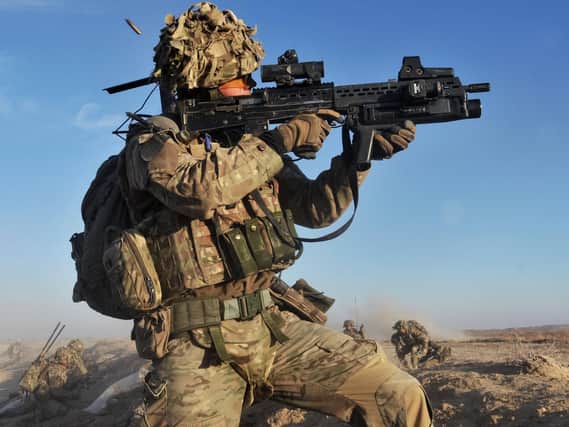 A soldier with the 4th Mechanised Brigade is pictured engaging the enemy during Operation Qalb in Helmand, Afghanistan.