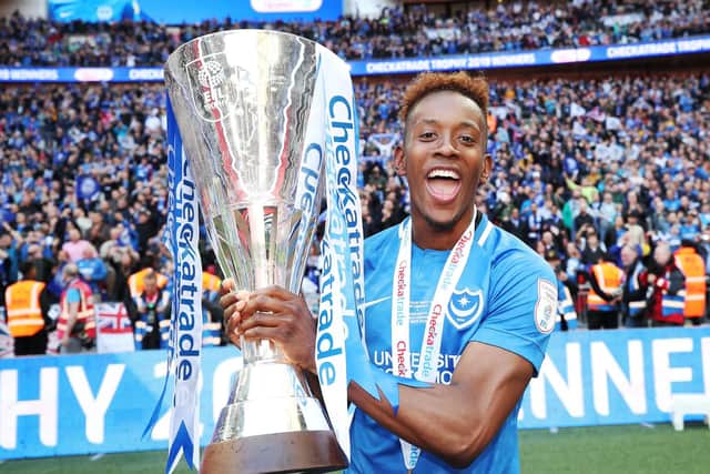 Jamal Lowe with the EFL Trophy last season following a penalty shootout victory against Sunderland   Picture: Joe Pepler