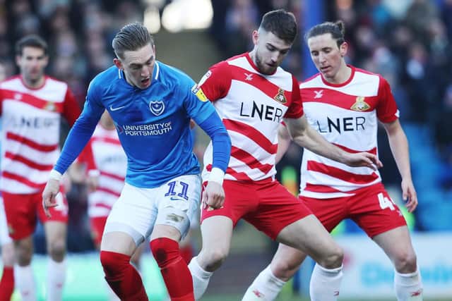 Ronan Curtis in action against Doncaster at Fratton Park last season. Picture: Joe Pepler