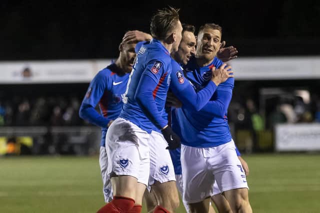 Pompey celebrate Brandon Haunstrup's goal in their 2-1 win at Harrogate Town. Picture: Daniel Chesterton/PinPep