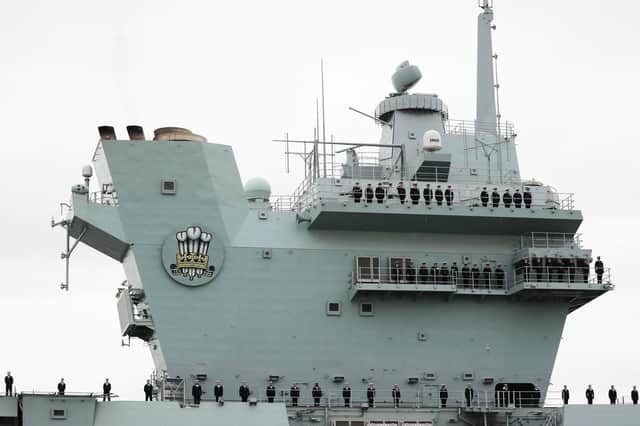 The aircraft carrier HMS Prince of Wales arrives at Portsmouth Naval Base. PA Photo. Issue date: Saturday November 16, 2019. The 3.1 billion warship left Rosyth dockyard in Scotland, where it was built, in September before undergoing eight weeks of sea trials. Photo credit should read: Steve Parsons/PA Wire