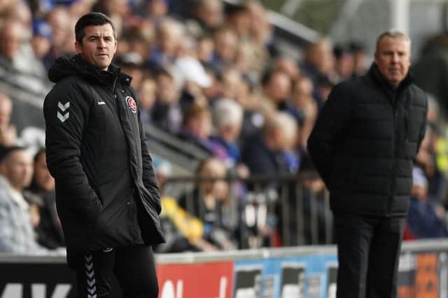 Fleetwood manager Joey Barton and Pompey boss Kenny Jackett Picture: Daniel Chesterton