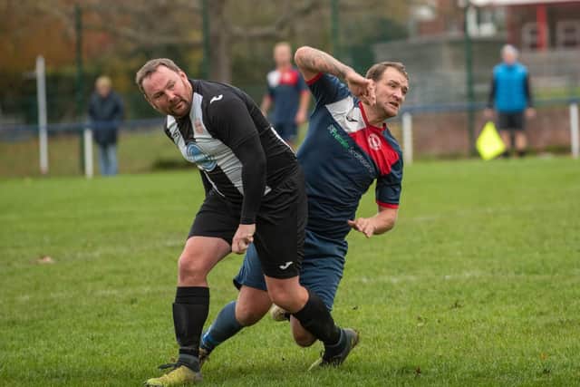 Hayling's Dan Mortimer and Paulsgrove's Jake Warlow.