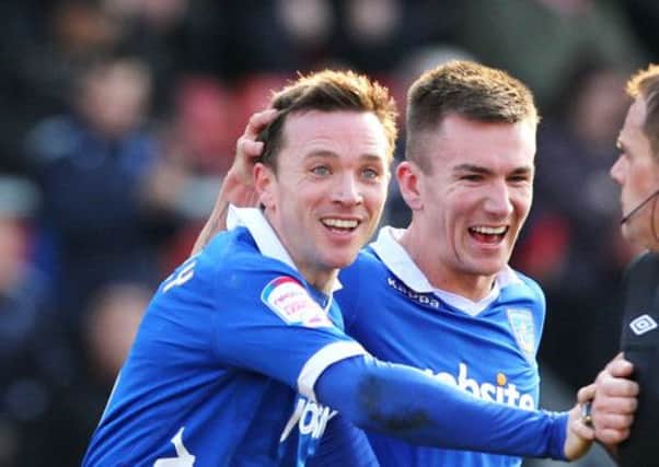 Jed Wallace, right, celebrates with goalscorer David Connolly in the 2-1 win at Crewe on Saturday  Picture: Joe Pepler