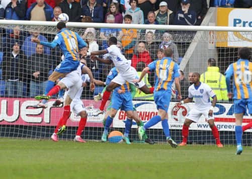 Shrewsbury's Connor Goldson scores the opening goal against Pompey Picture: Joe Pepler