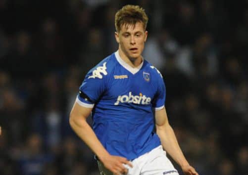 Adam Webster has been backed to challenge for a place in the heart of Pompey's defence next season