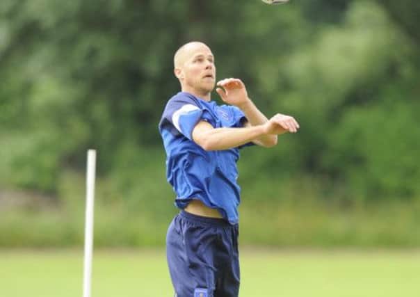 Johnny Ertl will wear the number 13 shirt for Pompey this season