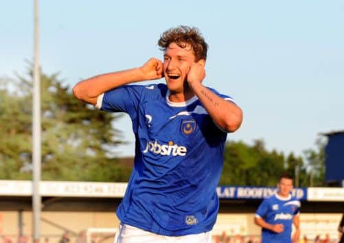 Ryan Bird celebrates his early opener against the Hawks Picture: Ian Hargreaves