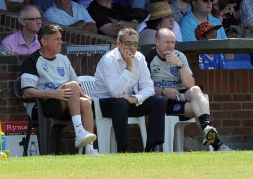 Guy Whittingham, centre, looks on from the bench at Nyewood Lane Picture: Paul Jacobs (131957-30)