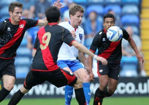 Simon Ferry takes on Rayo Vallecano. Picture: Joe Pepler