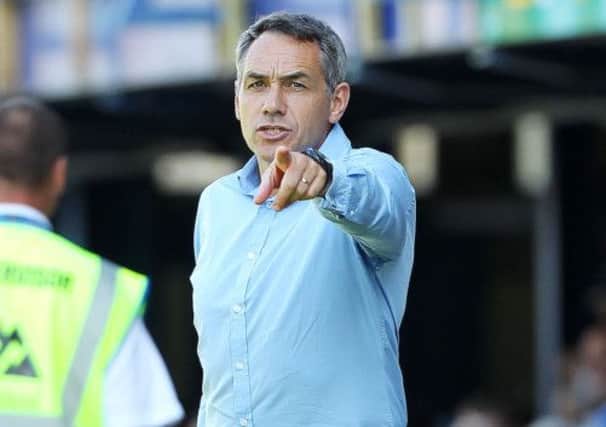 Guy Whittingham has some tough decisions to make before the Oxford game Picture: Joe Pepler