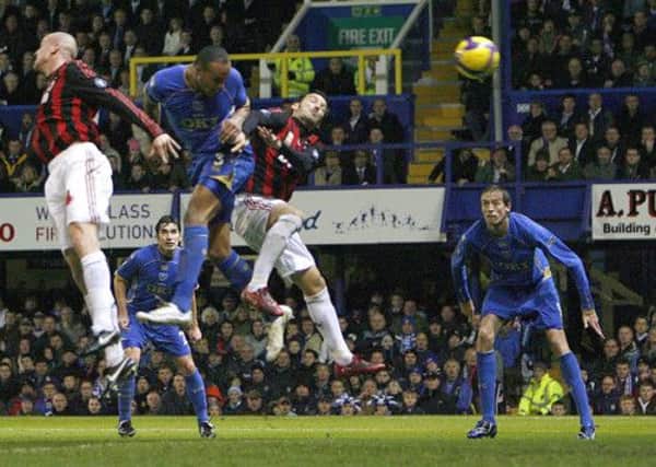 Younes Kaboul gets between Milan defenders Philippe Senderos and Gianluca Zambrotta to head Pompey in front in the 62nd minute to engite an already booming atmosphere at Fratton Park back on November 27, 2008