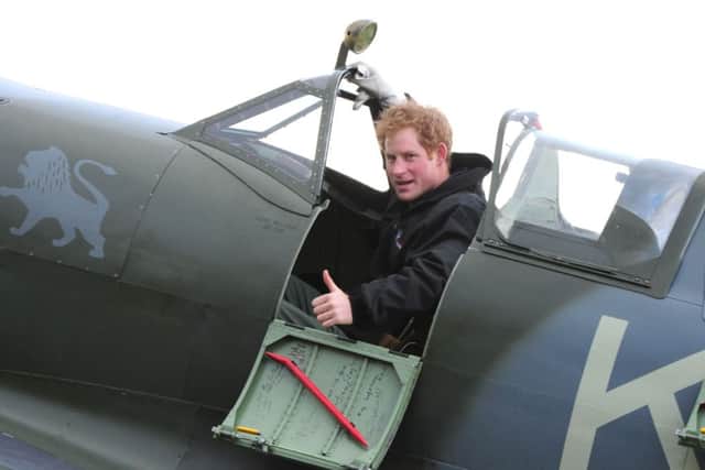 C140205-5 Climbing into the Spitfire  PICTURES BY KATE SHEMILT