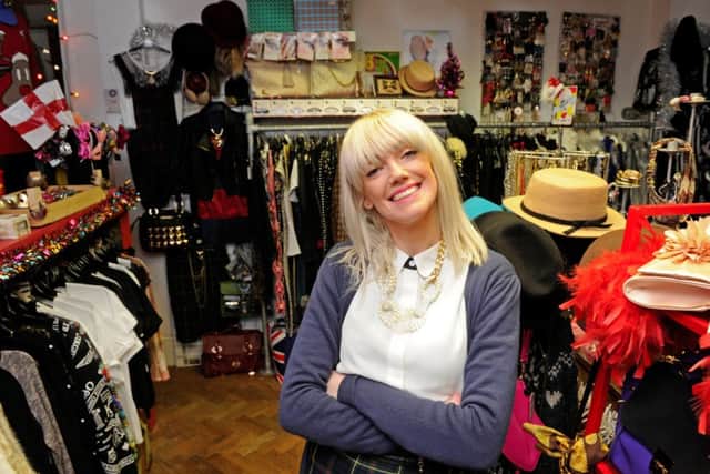 Roxanne Morris celebrates after winning the News small retailer of the year award last year for running her successful clothing shop in Southsea.
Picture: Ian Hargreaves (133603-4)