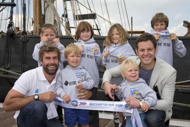 Iain Percy, Bart Simpson's children Freddie and Hamish, TV presenter Matt Baker and children from the trust open the PSP Southampton Boat Show 2014