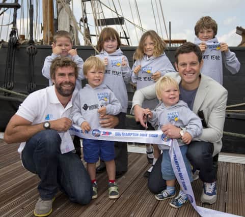Iain Percy, Bart Simpson's children Freddie and Hamish, TV presenter Matt Baker and children from the trust open the PSP Southampton Boat Show 2014