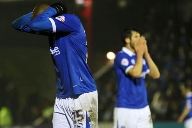 Nigel Atangana and Danny Hollands are dejected at the final whistle. Picture: Joe Pepler