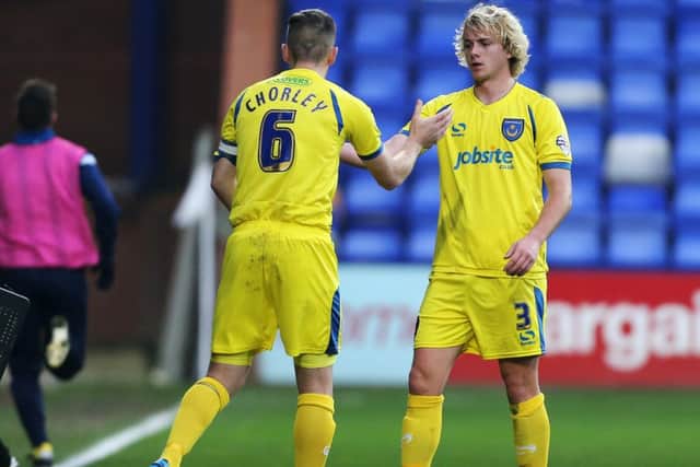 Jack Whatmough, right, is ready to make a Pompey return. Picture: Joe Pepler